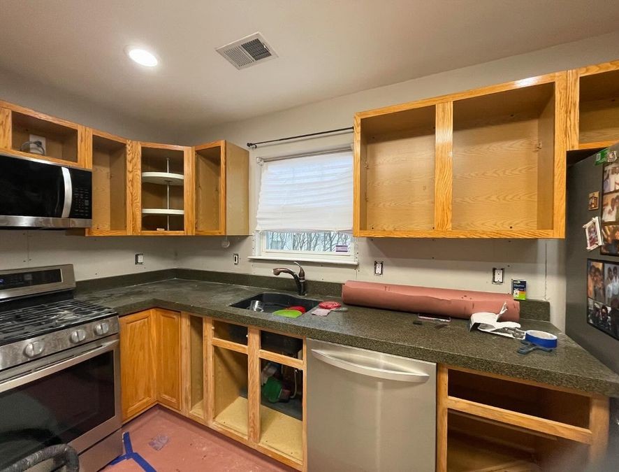 Kitchen before: oak cabinets