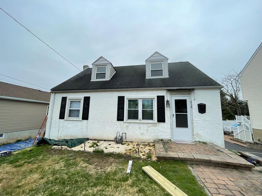 House exterior before: peeling paint