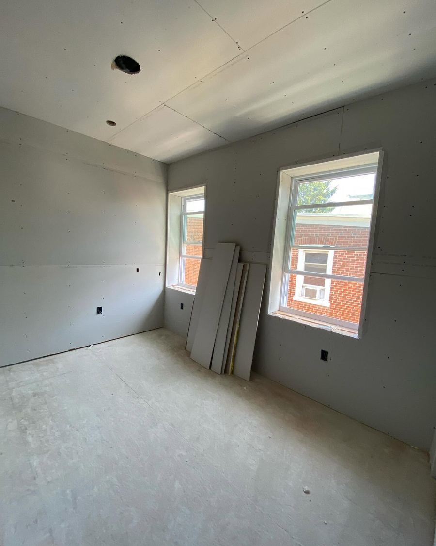 Drywall hung and taped, ready for finishing