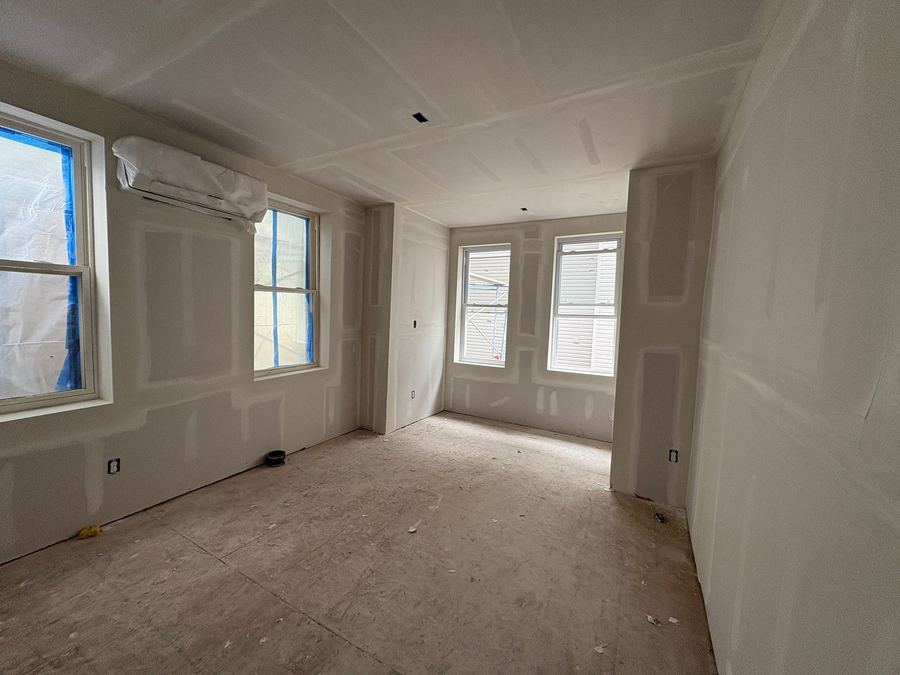 Drywall taped and finished, ready for paint