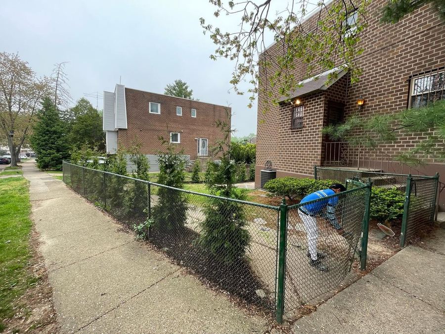 Before: the old chain-link fence