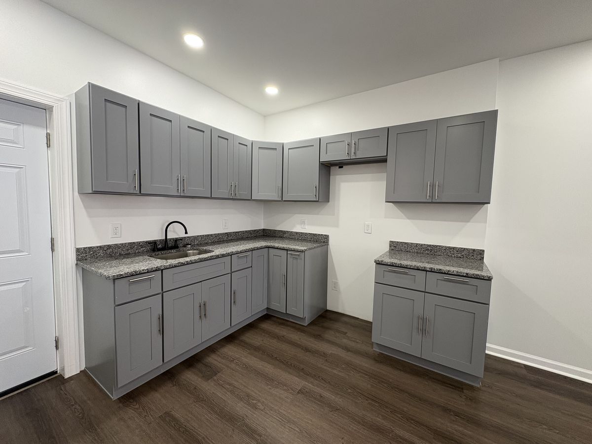 Kitchen flooring with gray cabinets