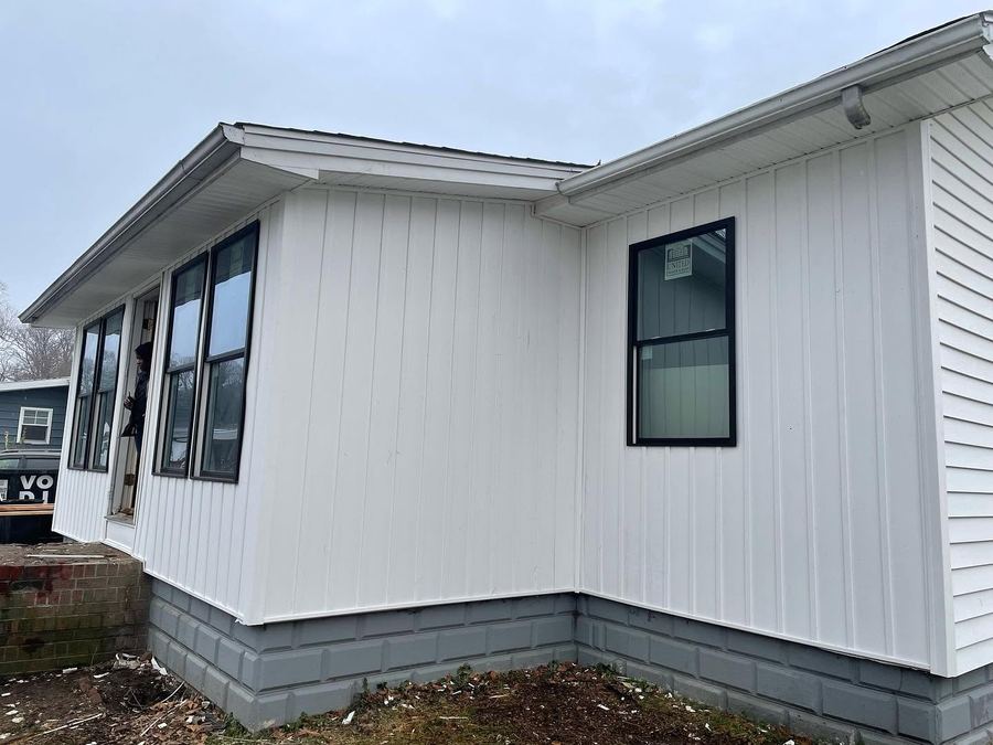 New board and batten siding on a single-story home