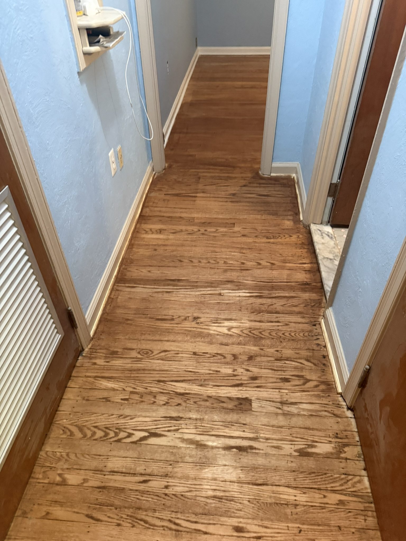 Refinished oak hallway floor in a Southampton home