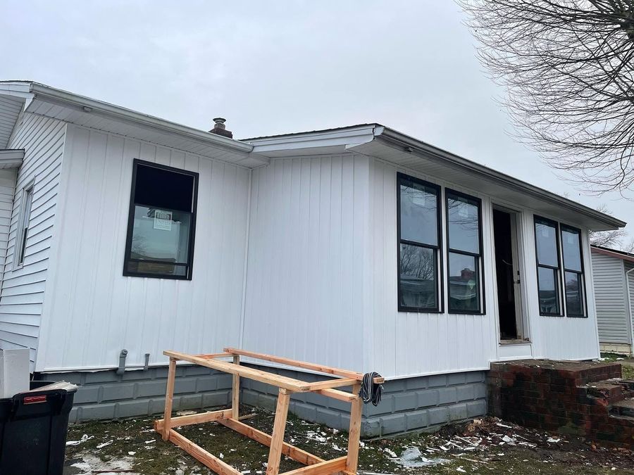 New windows and siding on ranch home